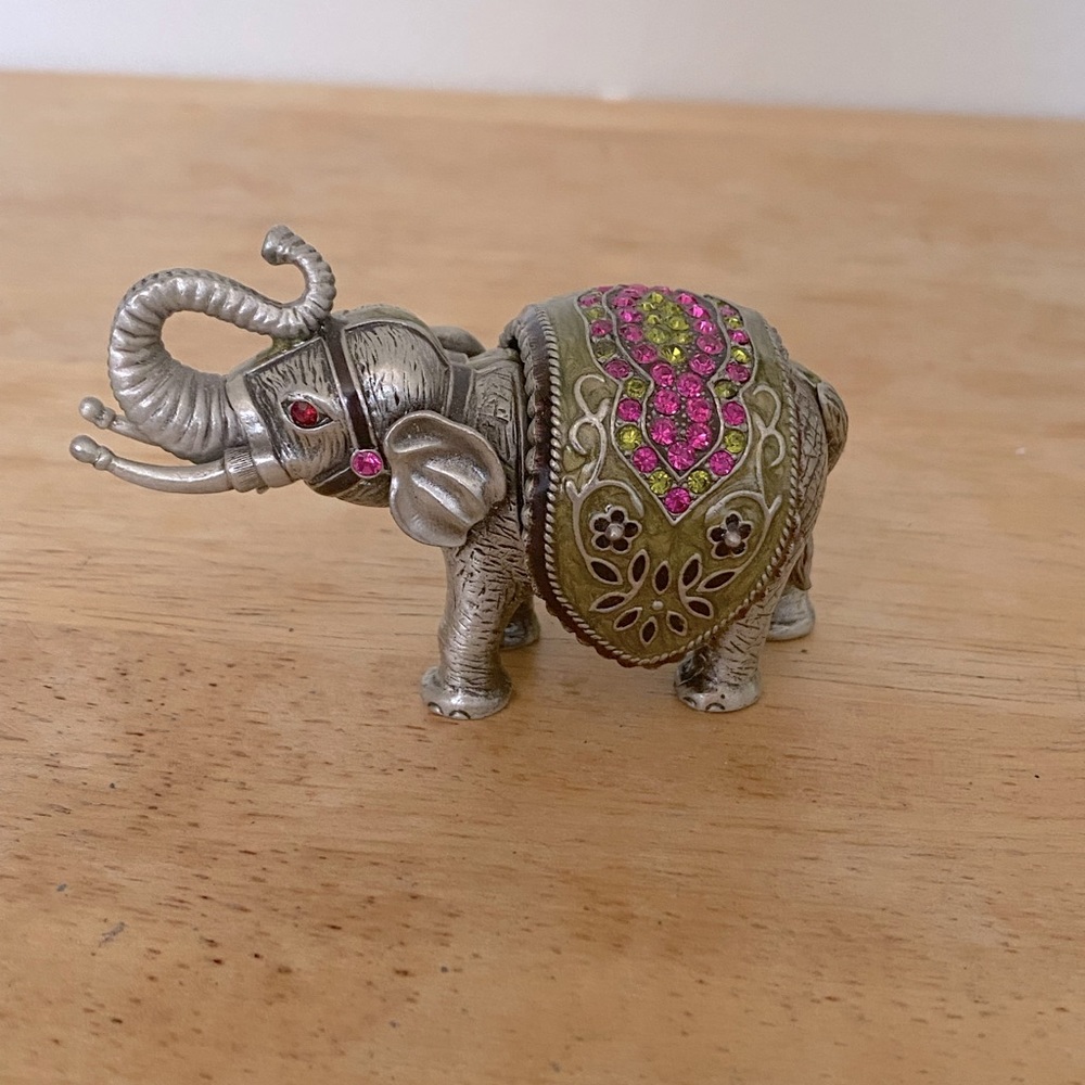Pewter elephant with swarovski crystals trinket box. Used good condition.